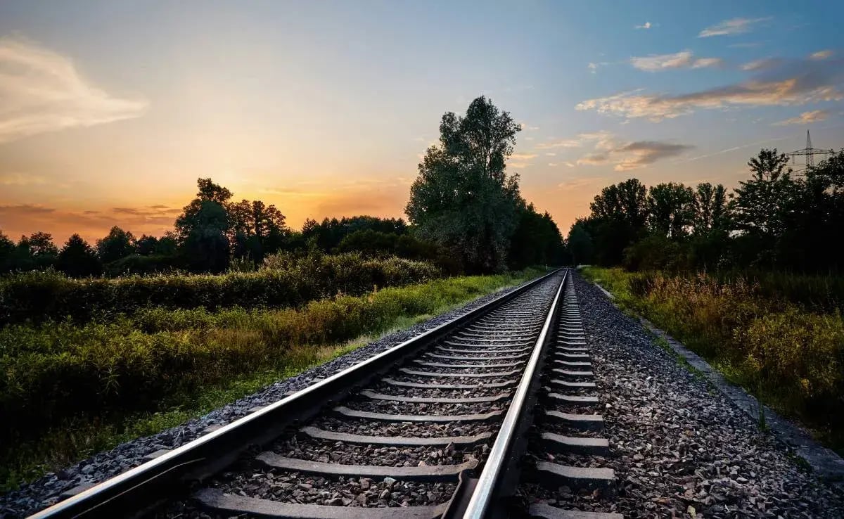 railway-lines-infront-of-nature-and-the-sunset