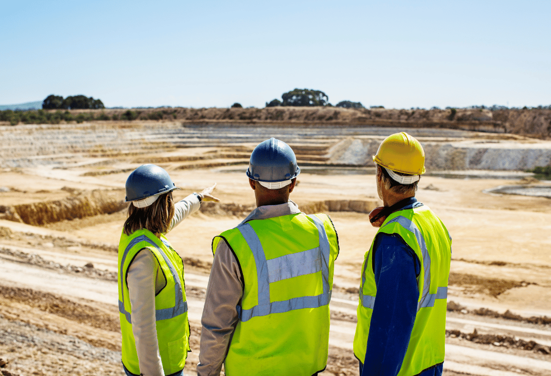 Workers at a quarry site with a silica dust extraction system promoting a healthier work environment. 